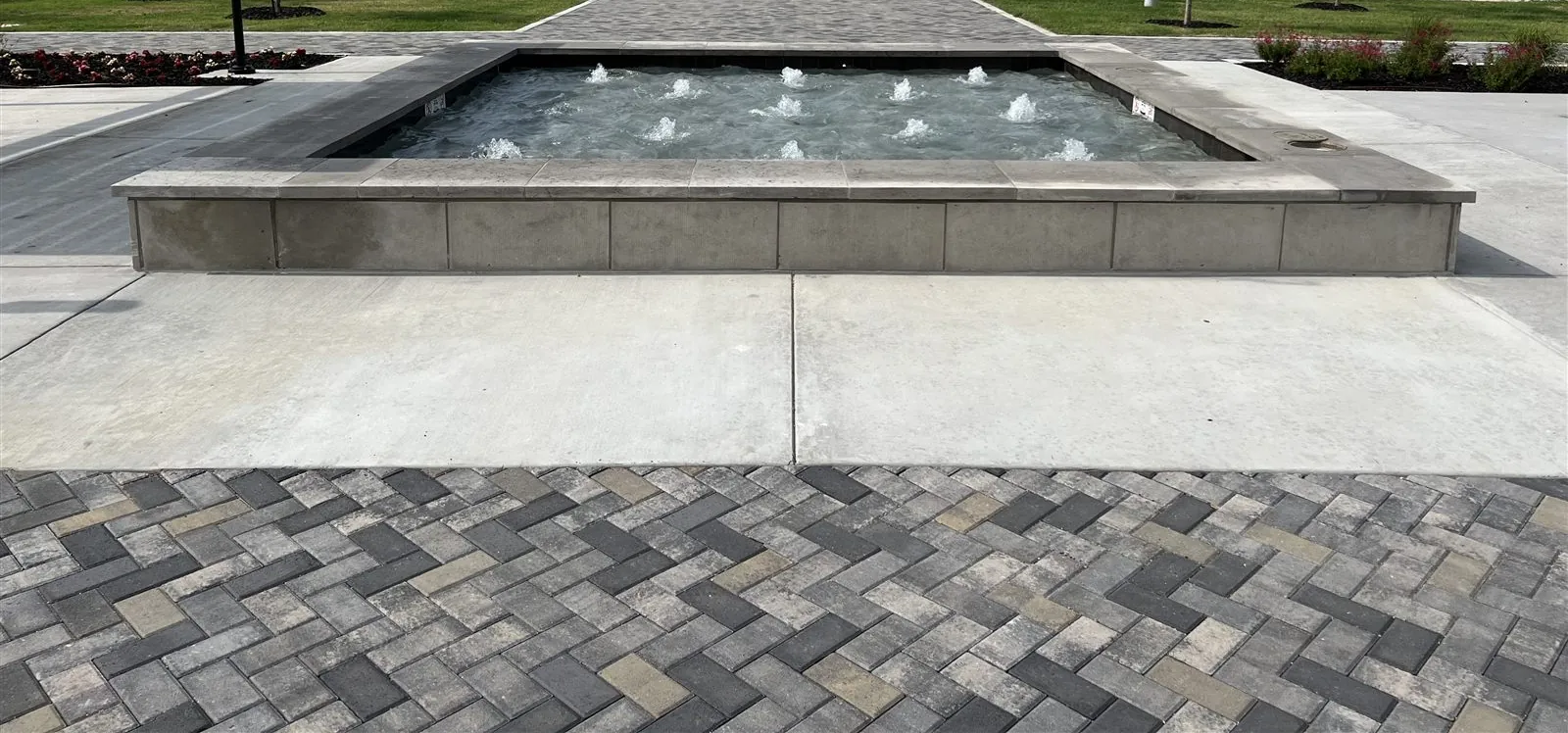 Center fountain at Hollyhock in Frisco, TX, built by Lucent Pools