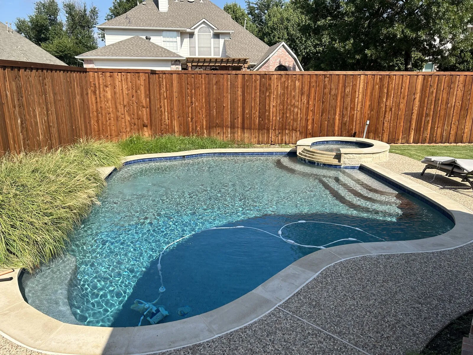 Pool remodel after — Lucent Pools DFW pool remodeling results
